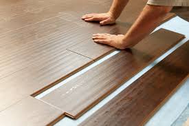 Installer with laminate flooring 